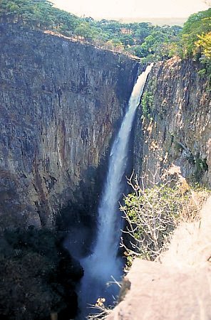 Kalambo Falls dropping hundreds of meters down a sheer vertical cliff face canyon on the Tanzania border