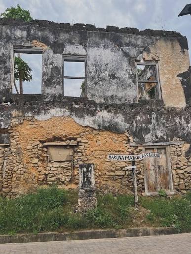 The historic German Boma fortress administrative building in Bagamoyo showing arched Swahili entryways