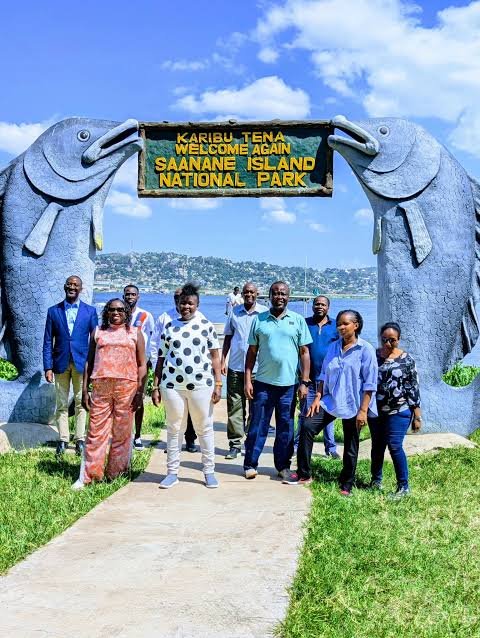 Granite rock boulders and green trees on Saanane Island National Park with Lake Victoria backdrop